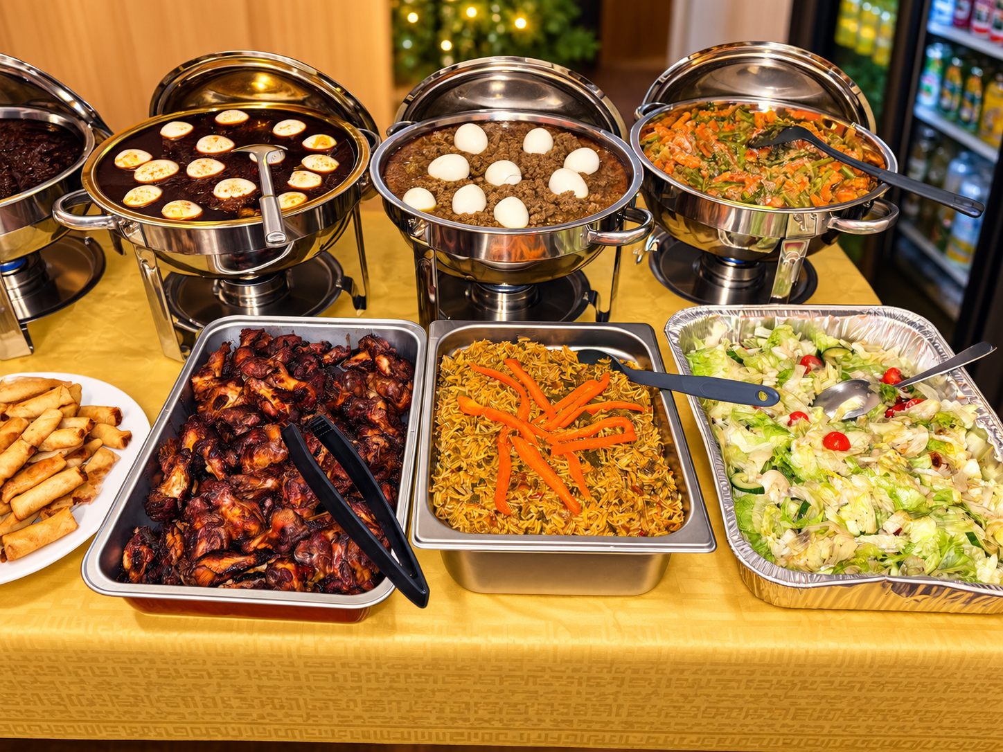 Abyssinia catering buffet with traditional stews, vegetables, rice and sambusas